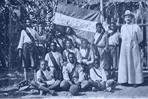 CVV Republic — Curaçao's first football club, photographed with a priest in the garden of the Santa Famia Church, 1909